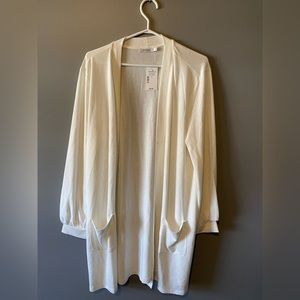 Ricki’s White Cardigan with Cuffed Sleeves